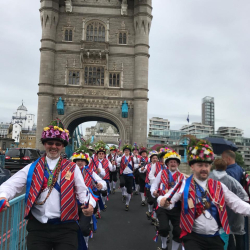 Saddleworth Morris Men crossing Tower Bridge, London